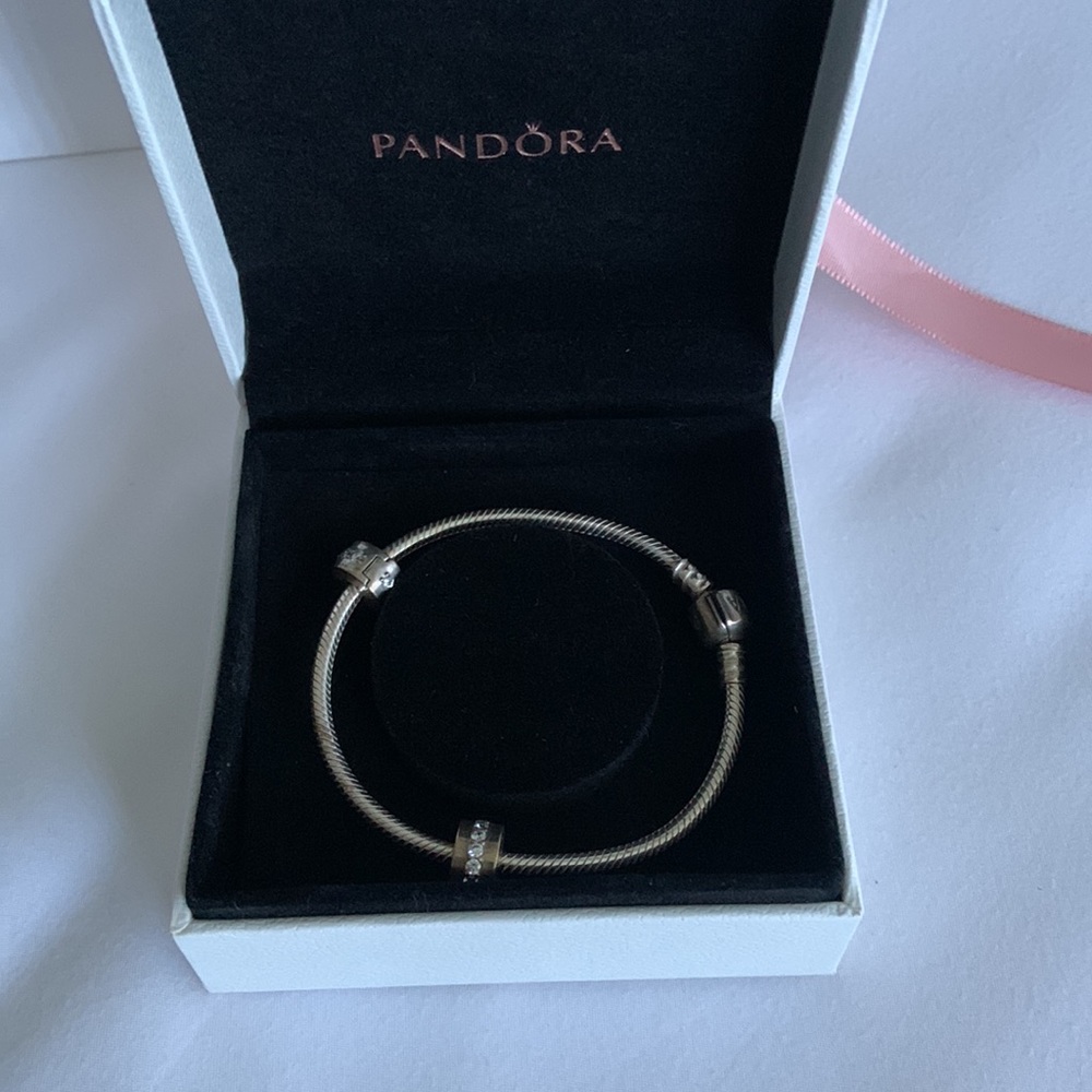 Pandora starter bracelet with stopper charms